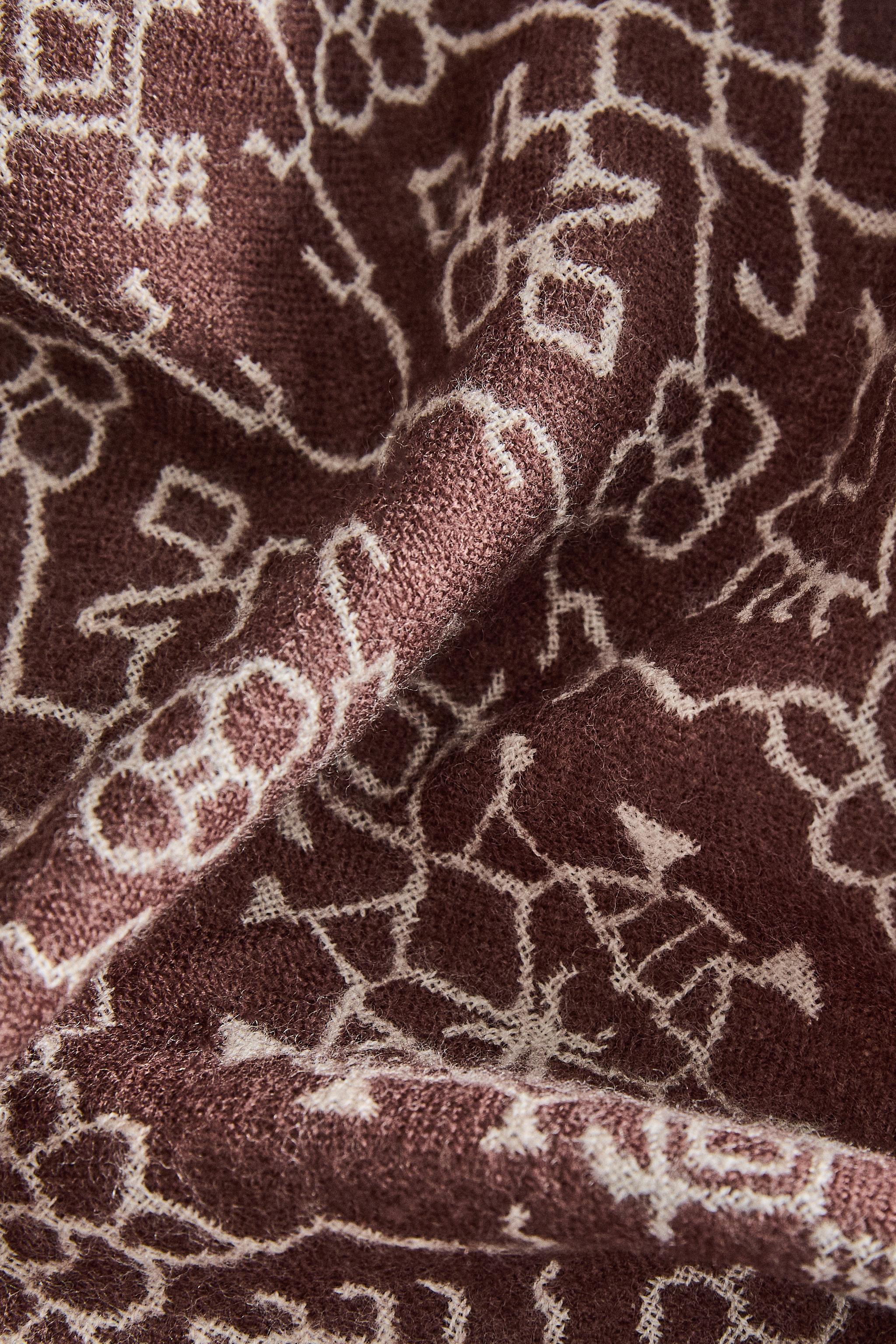 JACQUARD BLANKET